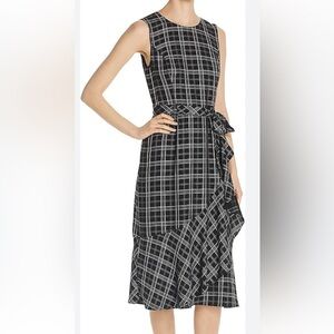 This is a Calvin Klein Women's Plaid Sleeveless Belted Midi Dress US 6.